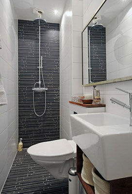 Замість плитки ванну кімнату можна обробити і панелями ПВХ: вони також легко миються і добре виглядають